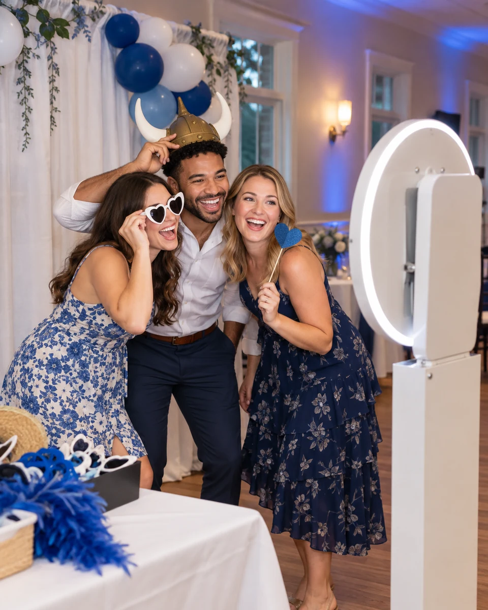 Friends using a fun open-air photo booth