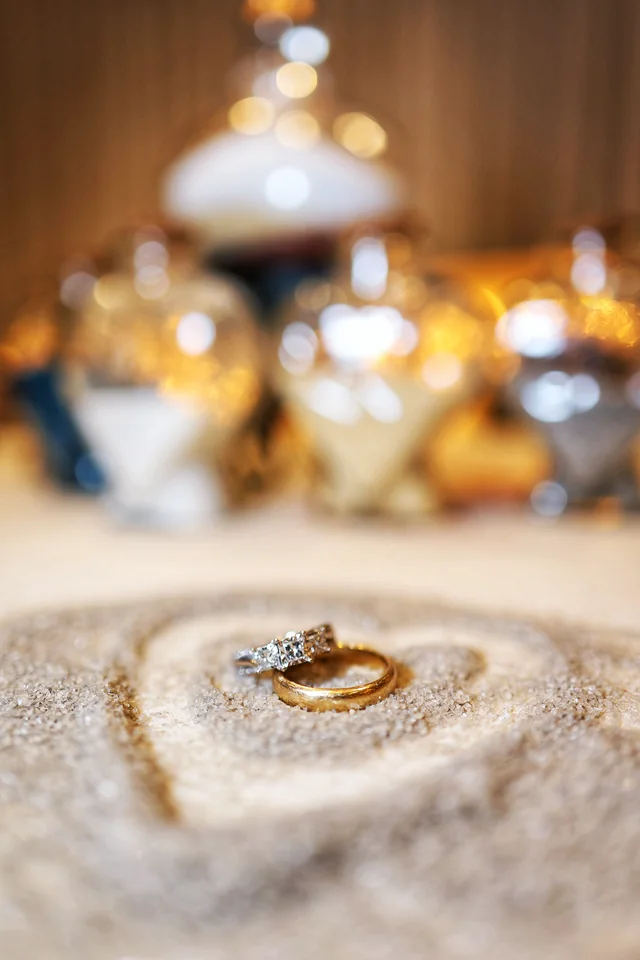 Wedding rings arranged on reception fabric